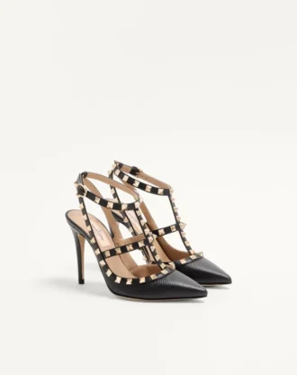 Rockstud Pumps aus genarbtem Leder mit Fesselriemchen, 100 mm